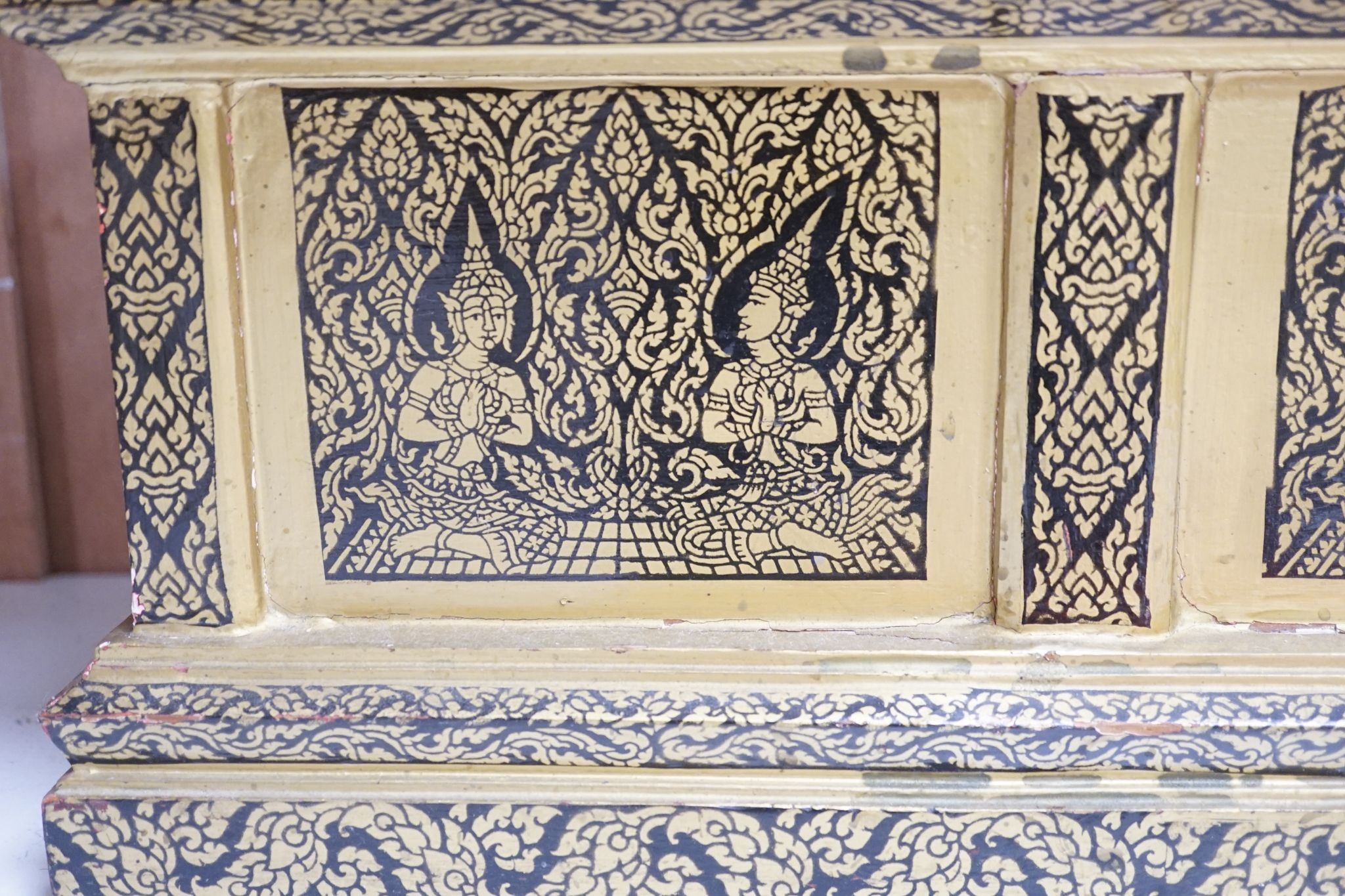 A Thai Buddhist sutra holder, 67 cms wide x 21 cms high.